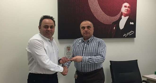 Bostanlıspor'dan Arslan'a teşekkür plaketi...