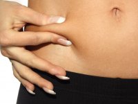 Gergin bir karın için kilo vermek şart