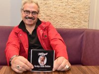 Karşıyakalı emekli öğretmen şarkısıyla tıklama rekoru kırıyor