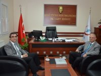 Kaymakam Yücel yeni başhekimi ziyaret etti