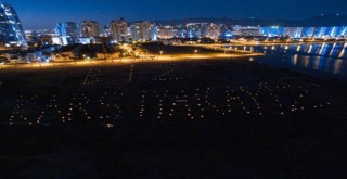 Karşıyaka'da TOKİ'nin satışına mumlu protesto